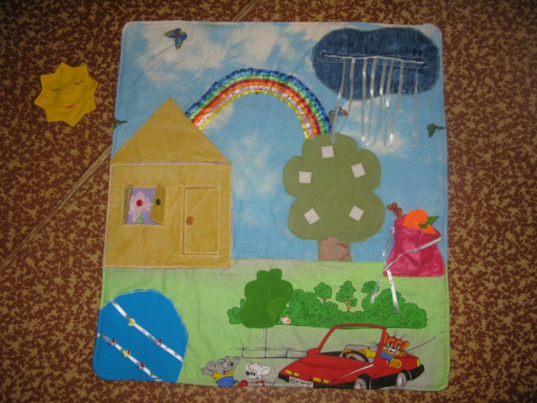 Развивающий коврик.