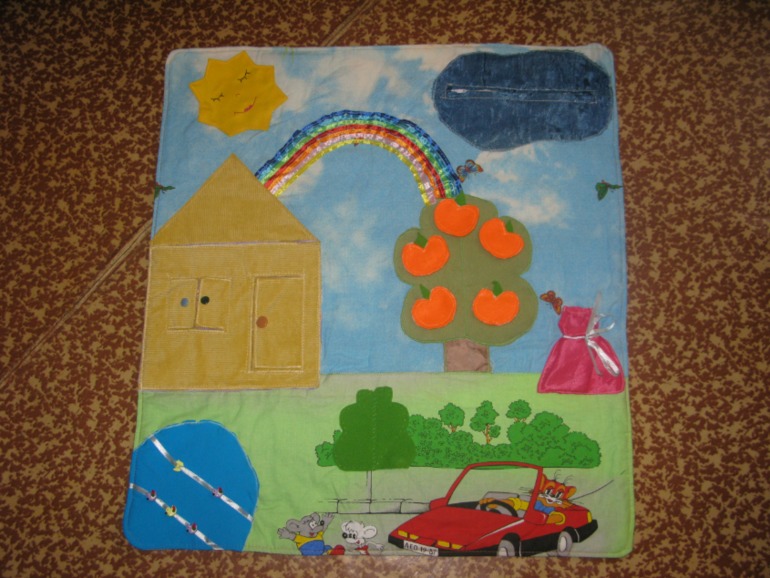 Развивающий коврик.